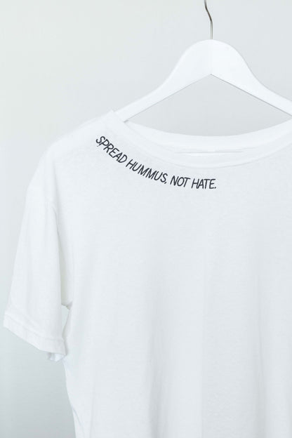 Close up of the Spread Hummus Not Hate slogan embroidered along the collar of the white tee